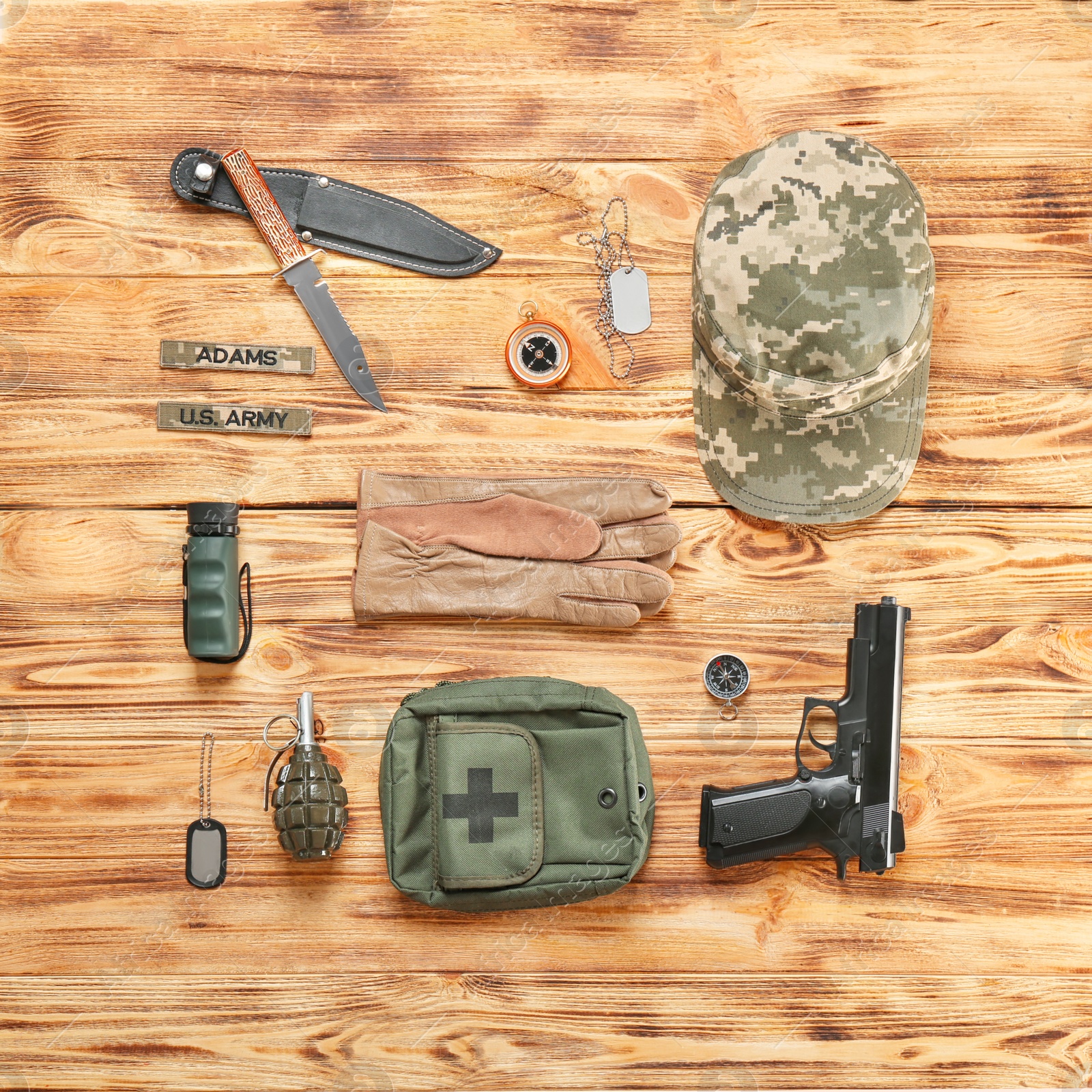 Photo of Set of military equipment on wooden background, flat lay