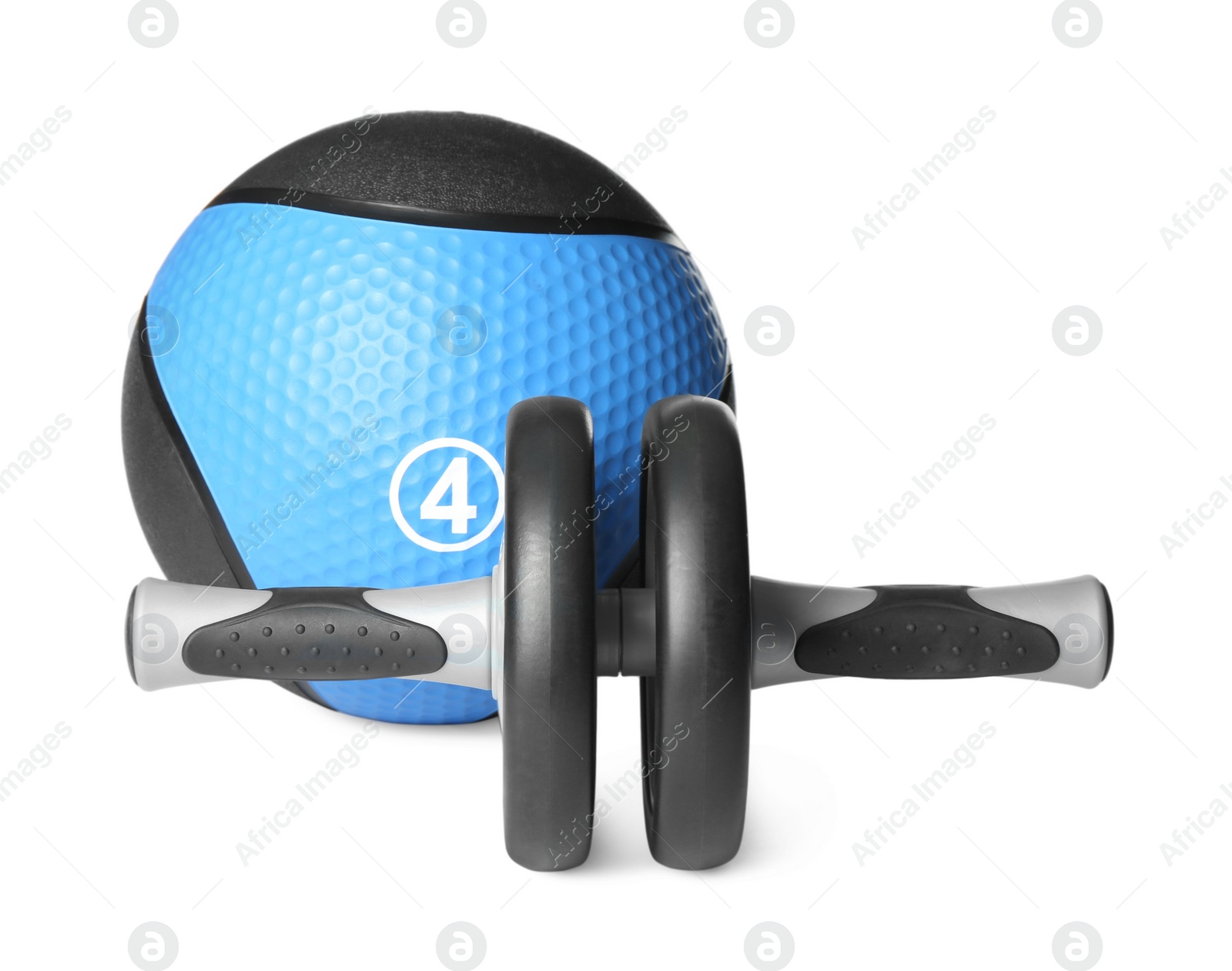 Photo of Medicine ball and abdominal wheel on white background