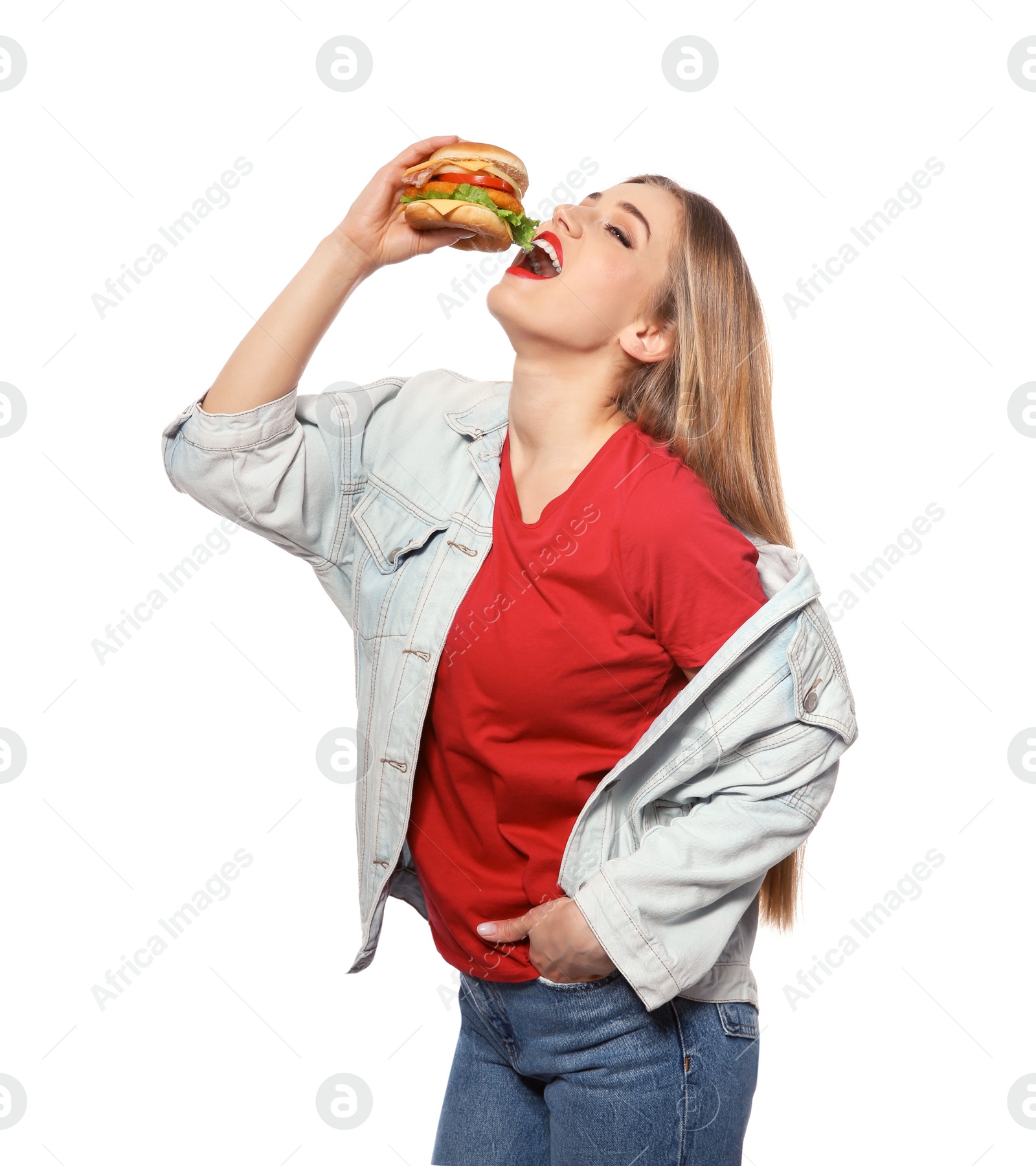 Photo of Pretty woman eating tasty burger isolated on white