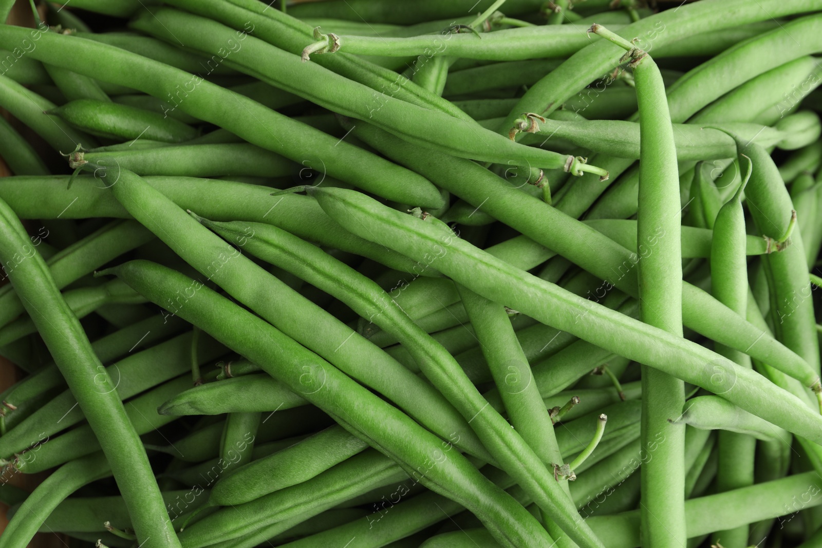 Photo of Many fresh green beans as background, closeup