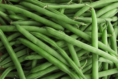 Many fresh green beans as background, closeup