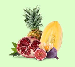 Image of Many different fresh fruits on pastel light green background