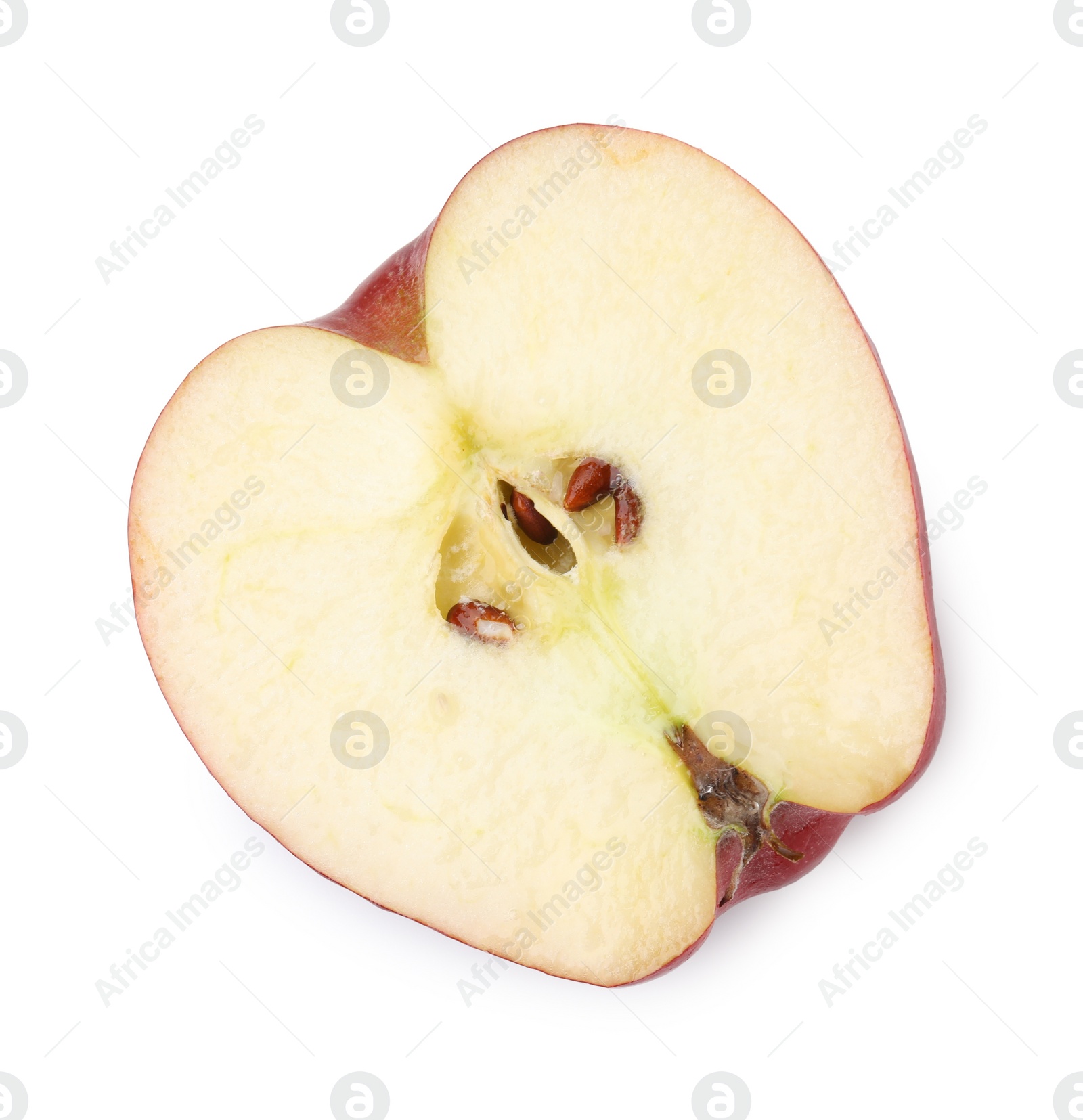 Photo of Half of ripe red apple on white background, top view