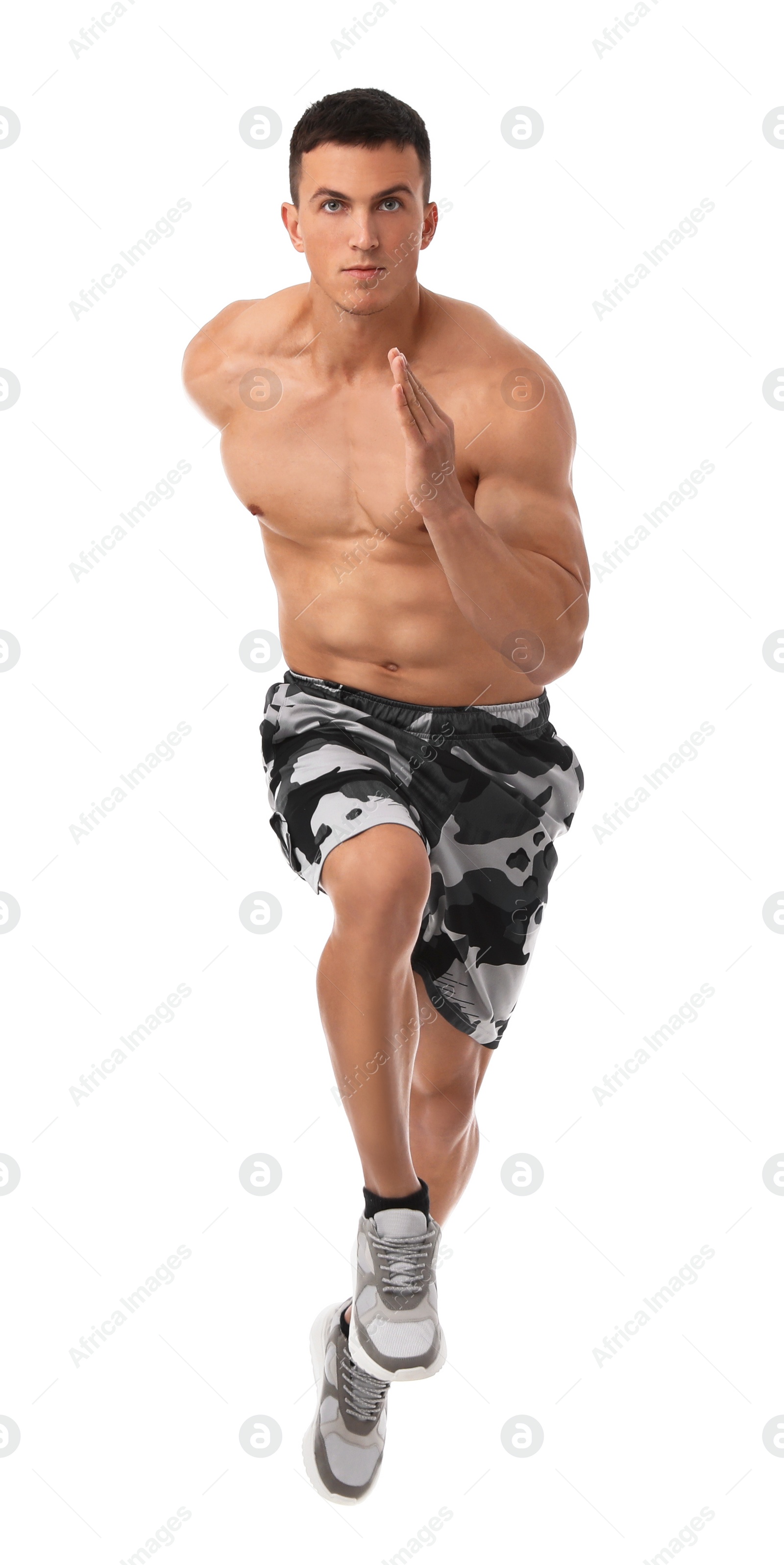 Photo of Athletic young man running on white background