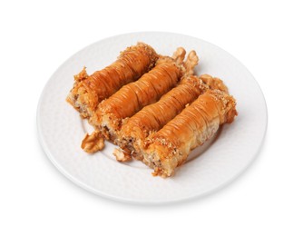 Photo of Eastern sweets. Pieces of tasty baklava isolated on white