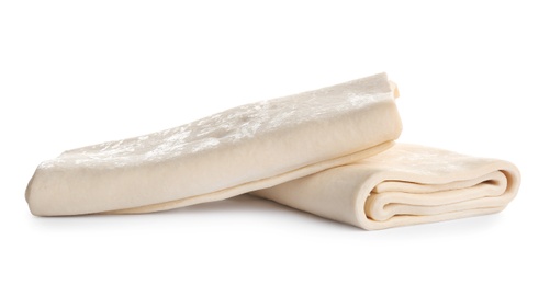 Photo of Fresh dough on white background. Puff pastry