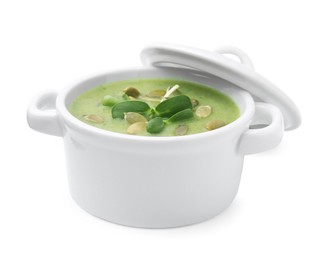 Photo of Delicious broccoli cream soup with pumpkin seeds isolated on white