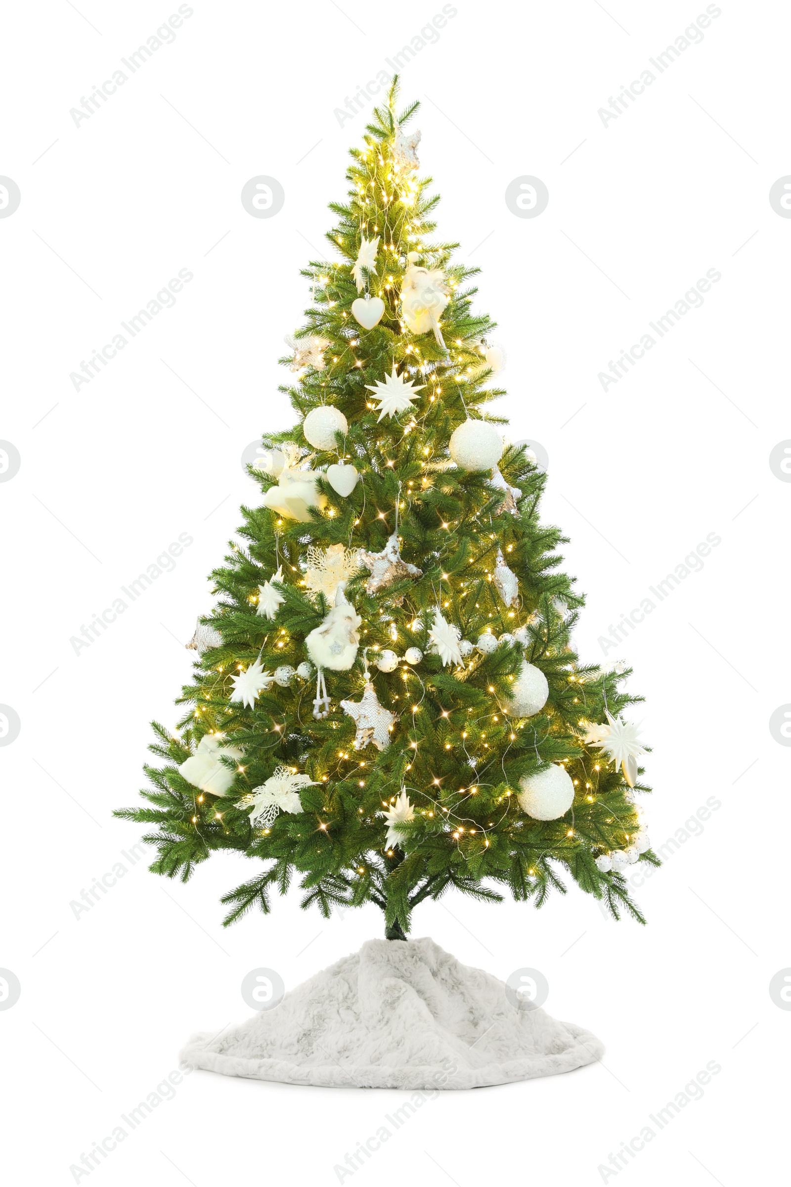 Photo of Decorated Christmas tree with faux fur skirt isolated on white