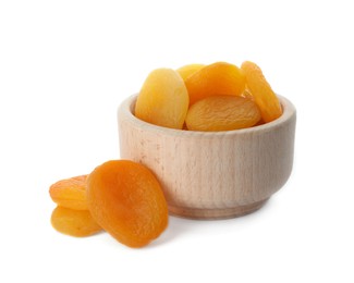 Photo of Ceramic bowl with tasty dried apricots isolated on white