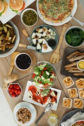 Photo of Brunch table setting with different delicious food, flat lay