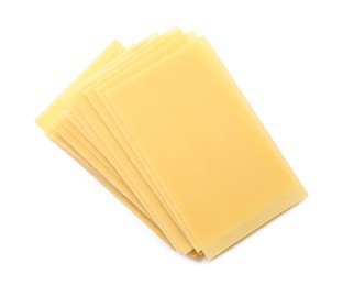 Photo of Stack of uncooked lasagna sheets isolated on white, top view