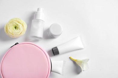 Photo of Flat lay composition with cosmetic products on white background