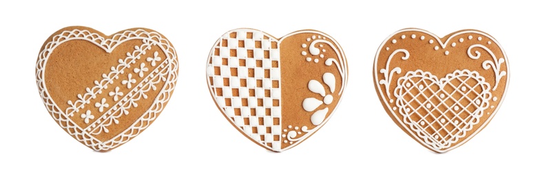 Image of Set of Christmas gingerbread heart shaped cookies on white background. Banner design