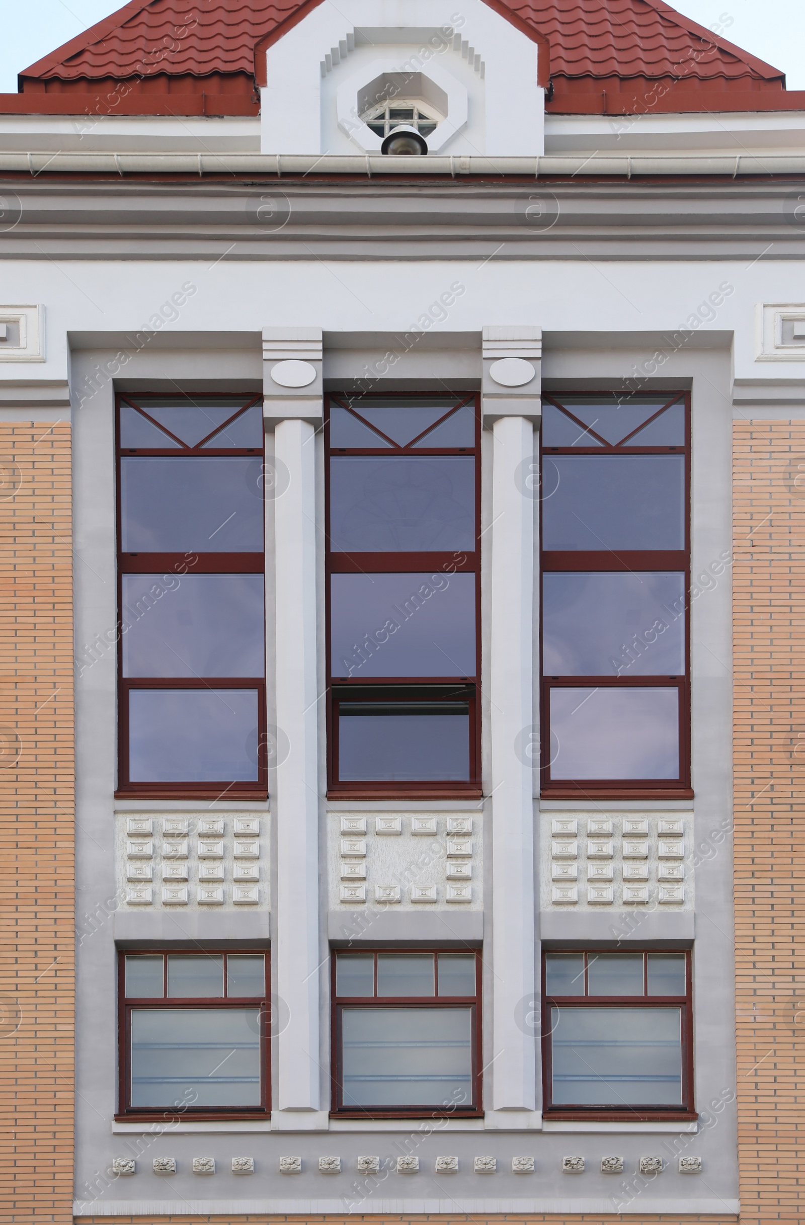 Photo of Wall of vintage building with beautiful windows