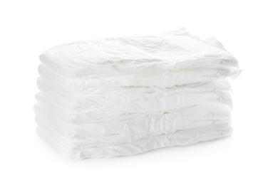 Stack of baby diapers isolated on white