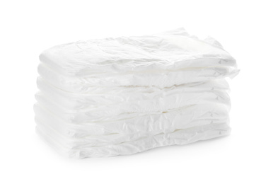 Photo of Stack of baby diapers isolated on white