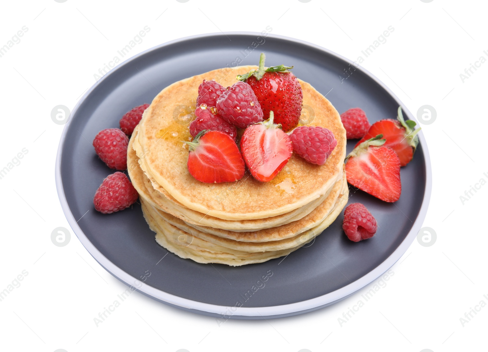 Photo of Tasty pancakes with fresh berries and honey on white background