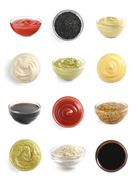 Set of different delicious sauces and condiments on white background