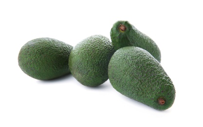 Ripe avocados on white background. Tropical fruit