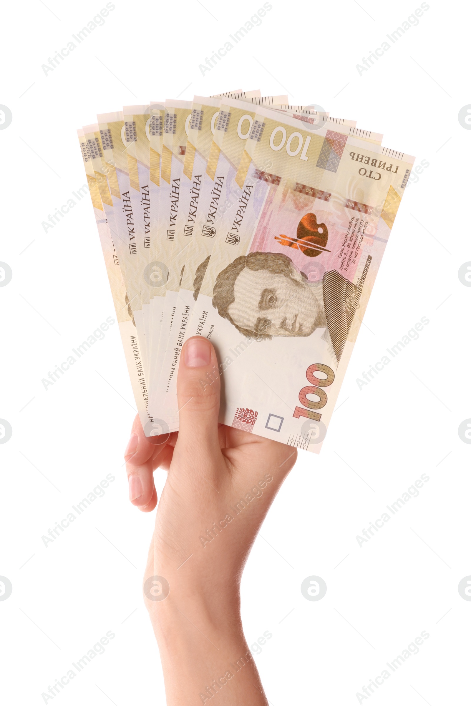 Photo of Woman holding Ukrainian money on white background, closeup