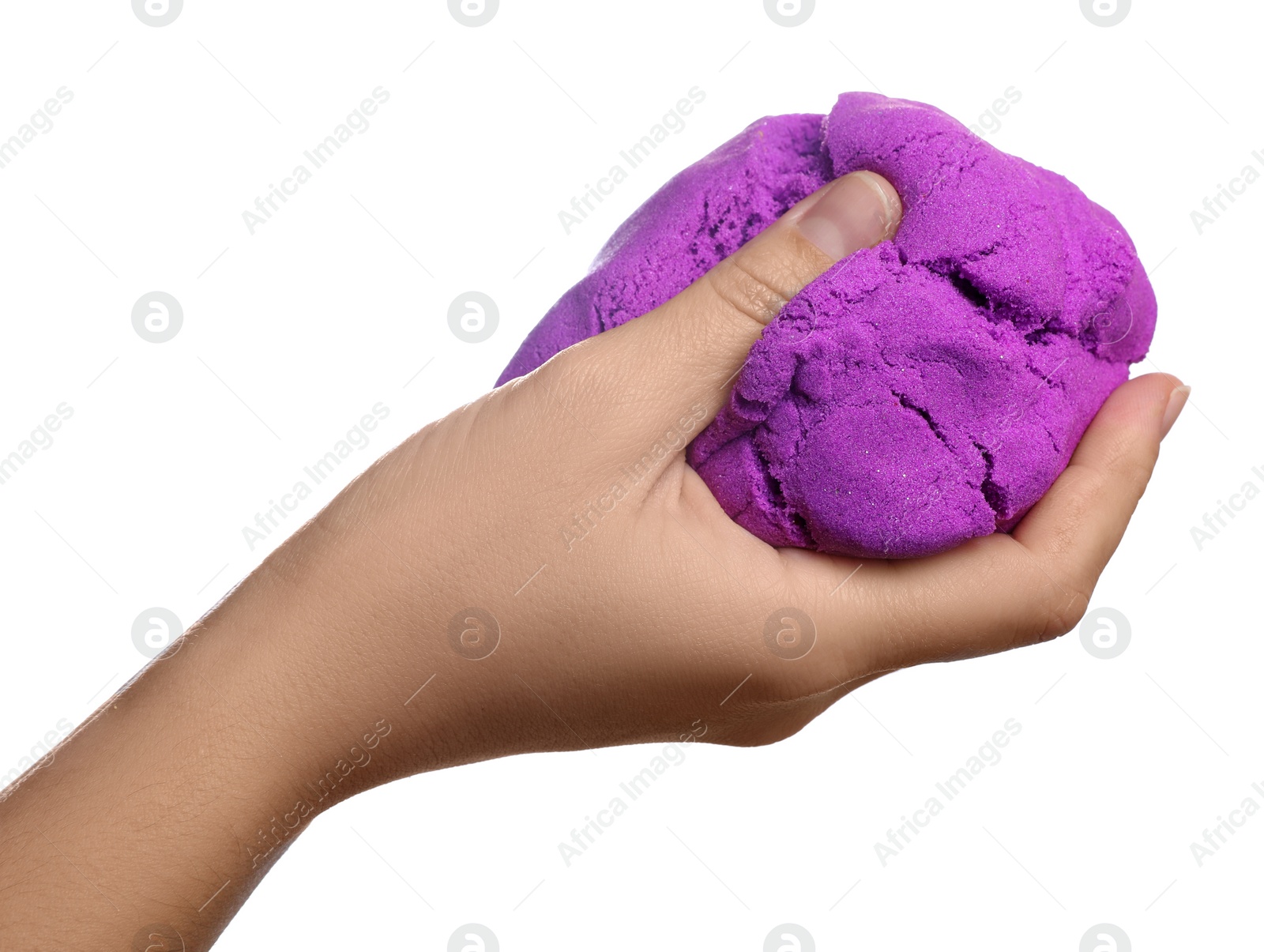 Photo of Woman playing with kinetic sand on white background, closeup