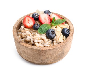 Photo of Tasty oatmeal with strawberries, blueberries and almond flakes in bowl isolated on white