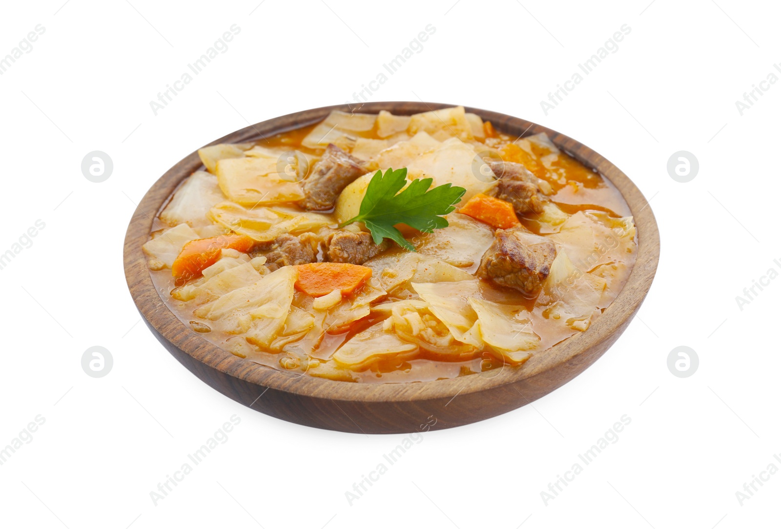 Photo of Tasty cabbage soup with meat, carrot and parsley on white background