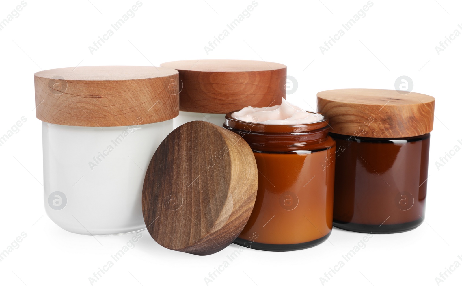 Photo of Jars of face cream isolated on white