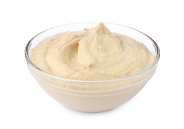 Photo of Bowl of tasty hummus isolated on white