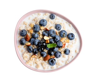 Photo of Tasty oatmeal porridge with blueberries on white background, top view. Healthy meal