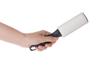 Photo of Woman holding lint roller on white background, closeup