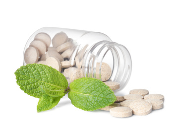 Bottle with vitamin pills and mint on white background