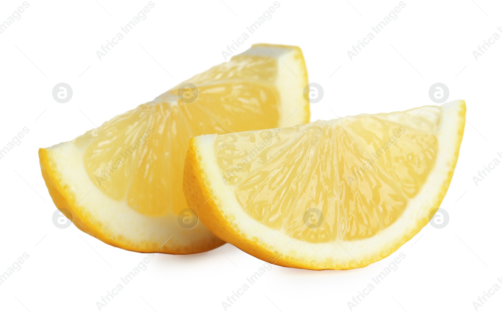 Photo of Pieces of fresh lemon isolated on white