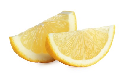 Photo of Pieces of fresh lemon isolated on white