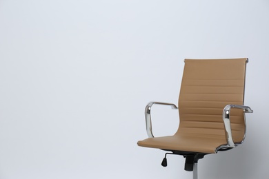 Photo of Comfortable office chair on white background, space for text