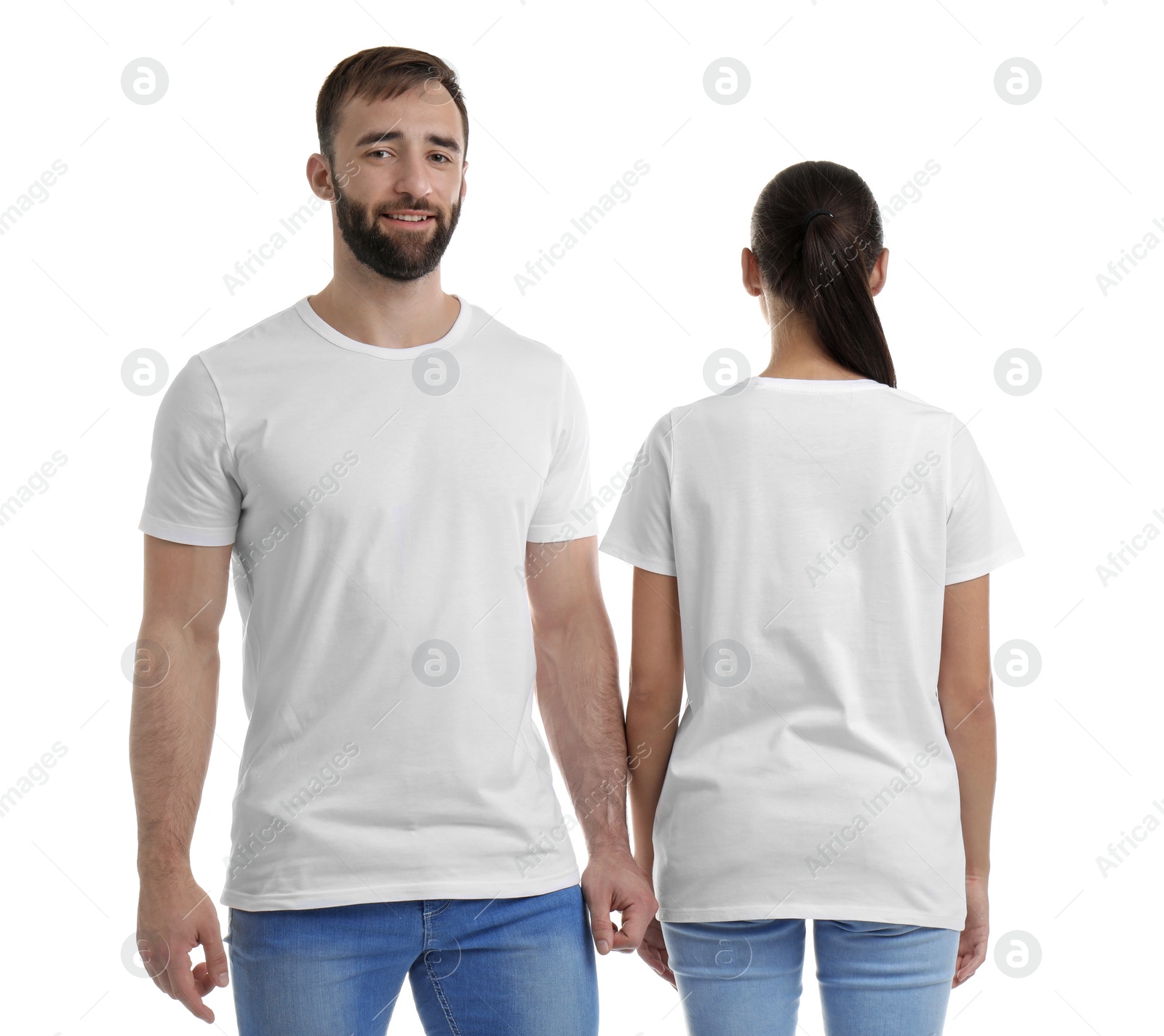 Photo of Young couple in t-shirts on white background. Mockup for design