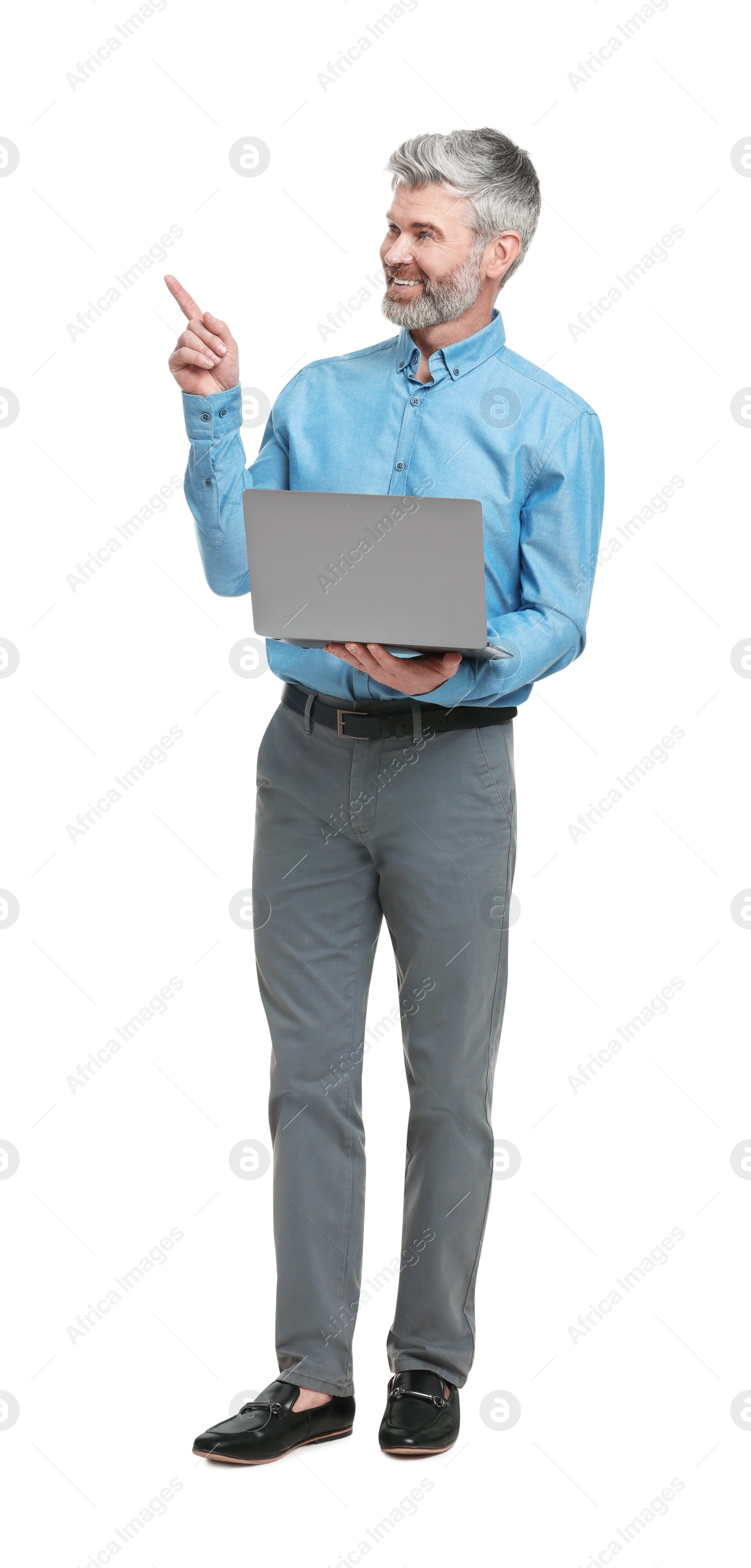 Photo of Mature businessman in stylish clothes with laptop on white background