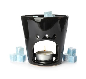 Photo of Stylish aroma lamp with essential wax cubes on white background