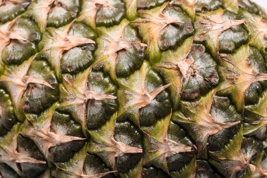 Photo of Fresh ripe juicy pineapple as background, closeup