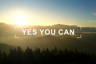 Image of Yes You Can. Motivational quote inspiring to believe in yourself. Text against beautiful mountain landscape at sunrise