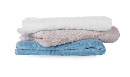 Folded fresh clean towels on white background