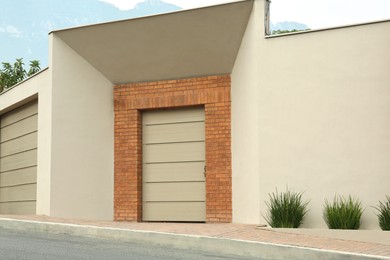 Photo of Beige wall with closed entrance door. Exterior design