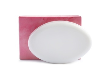 Soap bar and cardboard package on white background