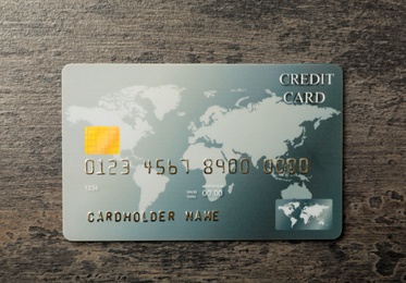 Photo of Credit card on grey table, top view