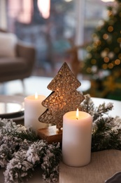 Elegant table setting with Christmas decor indoors