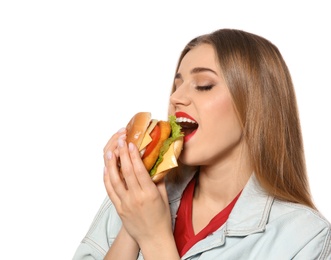 Pretty woman eating tasty burger isolated on white