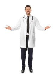 Photo of Full length portrait of smiling male doctor isolated on white. Medical staff