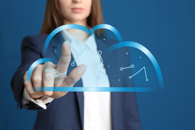 Image of Cloud technology concept. Woman on blue background, closeup