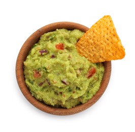 Photo of Bowl of delicious guacamole with nachos chip isolated on white, top view