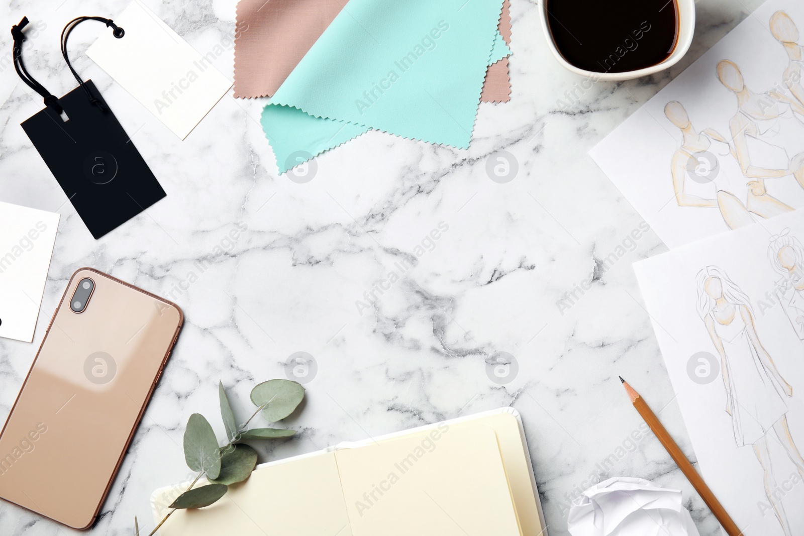 Photo of Flat lay composition with smartphone and accessories on white marble table, space for text. Designer's workplace